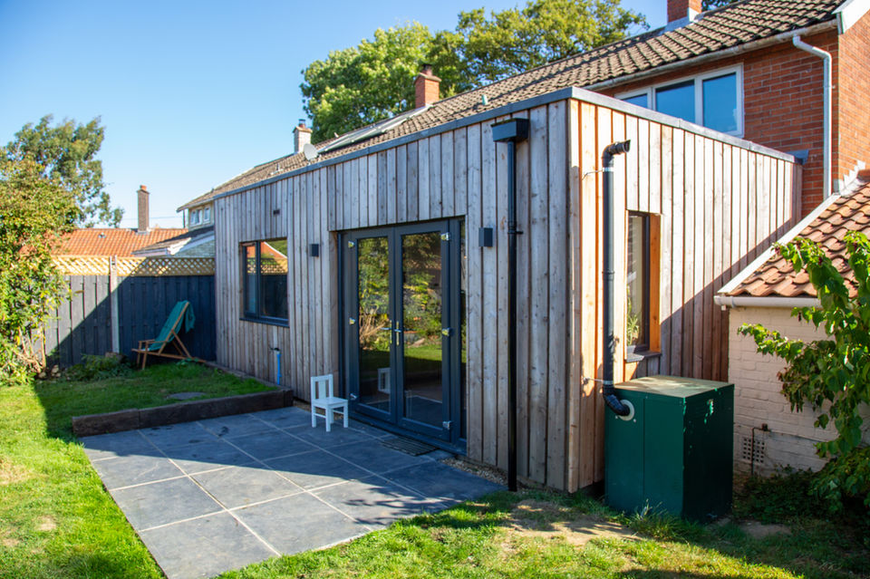 Larch-clad timber frame extension